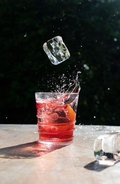 Swirling rope texture tipped with a berry makes your favorite drink more festive while adding a nice grip to this elegant glass. 3.5" x 3.5" x 4" Holds 15 oz. Glass Dishwasher safe, hand wash recommended Imported Cocktail Dark Photography, Fun Cocktail Photography, Moody Drink Photography, Cocktail Making Photography, Creative Drink Photography, Cocktail Photography Ideas, Mocktail Photoshoot, Negroni Photography, Coctails Photo Instagram