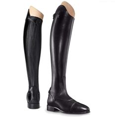 a pair of black riding boots with zippers