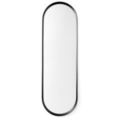 a mirror that is on the wall next to a white background with black trimmings