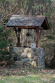 an old stone shelter in the woods