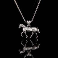 ★Introducing the stunning Silver Necklace Pendant, a true masterpiece of jewelry craftsmanship. This elegant necklace combines the timeless appeal of silver with the charm of a pendant, making it the perfect accessory for any occasion. Crafted from high-quality silver, this necklace radiates sophistication and durability. The pendant itself exhibits a captivating design, blending the grace of a horse with the intricate patterns of geometric origami. Each angle and curve is meticulously crafted, Sterling Silver Square Pendant Necklace, Sterling Silver Square Pendant Necklace With Diamond Cut, Sterling Silver Diamond Cut Square Pendant Necklace, Sterling Silver Faceted Square Pendant Jewelry, Faceted Sterling Silver Square Pendant Jewelry, Sterling Silver Faceted Square Pendant Necklace, Sterling Silver Faceted Pendant Necklace, Modern Sterling Silver Necklace With Diamond Cut, Faceted Sterling Silver Necklace