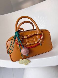 Uni Bag, Unusual Clothes, Look Boho Chic, Statement Handbag, Miu Miu Bag, Stylish Purse, Look Of The Day, Essential Bag, Purse Charms