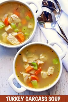 two white bowls filled with chicken and vegetable soup