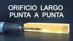 a drill is being used to make a piece of wood with the words, orifico largo punta a punta