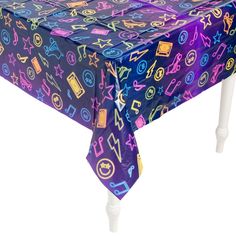 a purple table cloth with various symbols on it