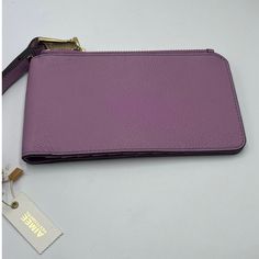 Aimee Kestenberg Light Mauve-Pink Leather Slim Wristlet Wallet Condition: New With Tags Color: Light Dusty Pink With Mauve-Pink Undertones, The Color Is Called Rose Quart But Looks More Like Light Purple Leather Construction With Gray Poly-Nylon Linings, Brass Hardware, Wrist Strap, Zippered Pocket, Snap Closure To: Ten Card Pockets, Mirror, & Id Window Pocket. Approximate Measurements: 4" Tall X 7.5" Long. Light Dusty Pink, Genuine Leather Wallets, Purple Leather, Slim Wallet, Lavender Purple, Wristlet Wallet, Wallet Chain, Leather Wristlet, Small Wallet