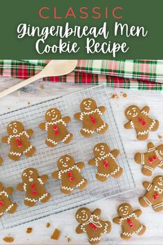 gingerbread men cookie recipe on a cooling rack with christmas cookies in the foreground