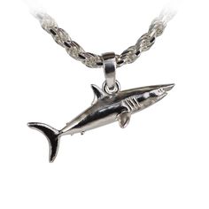 A finely detailed single-sided mako shark pendant displays a realistic and natural appearance. The mako shark is known for their speed, measuring 2.00” x 0.78” x 0.36” (chain not included) and is available in gold and silver of various grades. Made in the USA, Sea Shur Jewelry is meticulously crafted by a dedicated and detailed artist, who works with utmost accuracy to replicate sea life in high-quality metals. Gift boxed and protected in plastic within a cloth pouch All bails are solidly solder Ocean-inspired Sterling Silver Pendant Jewelry, Ocean-inspired Silver Charms Jewelry, Ocean-inspired Silver Necklaces With Charms, Silver Ocean-inspired Pendant Jewelry, Ocean-inspired Silver Pendant Jewelry, Ocean-inspired Silver Round Pendant Jewelry, Shark Pendant, Mako Shark, Cloth Pouch