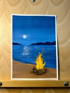 a painting of a campfire on the beach