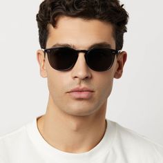 Level up your style game with our Jaxson XL sunglasses, offering a larger fit, round lenses, and rivet details. Cool Black Shield Sunglasses With Gradient Lenses, Black Sunglasses With Gradient Lenses For Everyday, Everyday Black Sunglasses With Gradient Lenses, Casual Aviator Sunglasses With Gradient Round Frame, Casual Black Sunglasses With Tinted Lenses, Casual Round Frame Sunglasses For Everyday, Modern Black Aviator Sunglasses For Everyday, Modern Black Aviator Sunglasses, Cool Black Sunglasses With Uv Protection