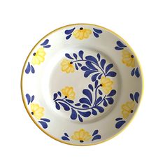 a yellow and blue flowered plate on a white background with an orange border around the edge