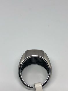 Cool Vintage Rock and Roll star men's ring Nice heavy ring, Silver Stainless Steel Unused stock from the 1980's We sizes 6.75-to 16 Many sizes These CAN NOT be re sized Please add your size to the order in a message and I will send the size you require. If I am out of stock in your size, I will list the ones I have available for replacement. If I am sold out in the sizes you would prefer, I will cancel and refund you, Thank you All jewelry is shipped in a nice gift box. Check out our over a THOU Formal Stainless Steel Rectangular Signet Ring, Formal Rectangular Stainless Steel Signet Ring, Silver Titanium Rings With Polished Finish, Classic Adjustable Stainless Steel Signet Ring, Rectangular Silver Stainless Steel Signet Ring, Modern Stainless Steel Signet Ring, Classic Silver Stainless Steel Signet Ring, Durable Silver Metal Ring, Titanium Silver Ring Jewelry