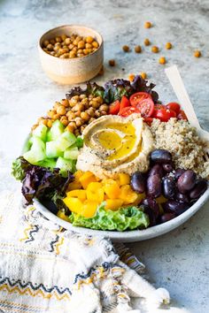 a bowl filled with lots of different types of food