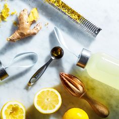 lemons, ginger and other ingredients on a counter top