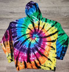 Processing time is 2 weeks. 80/20 cotton/poly blend hoodies it won't be exact to the listing photo but similar to it each one will be unique.  Wash along the first few washes on cold water. Tumble dry on low heat or air dry(recommended) Rainbow Hoodie, Reverse Tie Dye, Ice Dyeing, Graphic Shirts, Air Dry, Cold Water, Beauty Book, Etsy Accessories, Etsy Gift Card