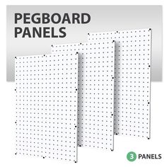 the pegboard panels are white with black dots on them and there is an image of two