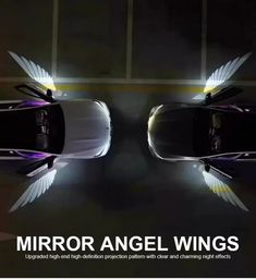 two cars with wings on them in the dark