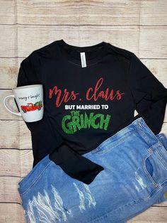 Mrs. Claus But Married to The Grinch Long Sleeve  PLEASE NOTE THAT FITTED IS EXTREMELY FITTED PLEASE SIZE UP 1-2 SIZES OR CHOOSE UNISEX IF YOU ARE UNCERTAIN FITTED ARE ON BELLA CANVAS  UNISEX ARE ON HANES   I CAN MAKE THIS IN A SHORT SLEEVE AND TANK TOP Glitter Vinyl for the font  Sideseamed Fitted: Dark Grey  is 52% combed and ringspun  cotton, 48% polyester Unisex: Dark Grey is 60% Cotton 40% Polyester Black & white shirts are 100% combed and ringspun cotton If you choose a white shirt the "bu Gift Rule For Christmas, Free Christmas Gift Tags, Married To The Grinch, Christmas Gift Tags Free, Free Christmas Gifts, Evening Dresses Short, Christmas Printable, Black And White Shirt, Mrs Claus