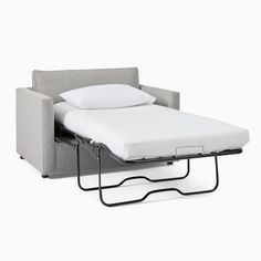 a couch with a pull out bed attached to it's back and side rails