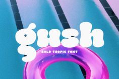 a pink and blue pool float with the word gush on it's side