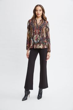 Express yourself in our Paisley Print Shirt. In soft metallic kissed georgette, the split neckline, sophisticated colors, and relaxed fit make it an easy addition to your wardrobe. T-Tahari Paisley Printed Long Sleeve Split Neck Shirt 100% Metallic Polyester Runs true to Size Model is 5'9" and wearing size S Dry Clean Only Imported Style #: THF49019 Chic Paisley Print Top For Work, Chic Paisley Print Top For Workwear, Chic Viscose Tops With Split Neck, Chic Viscose Top With Split Neck, Elegant Multicolor Fall Tops, Fall Paisley Print Tops For Work, Fall Paisley Print Work Tops, Chic Paisley Print Blouse For Work, Elegant V-neck Blouse With Paisley Print