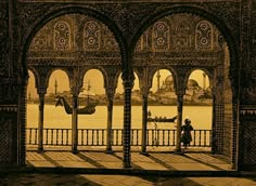 an old photo of a person sitting on a bench in front of some arches and water