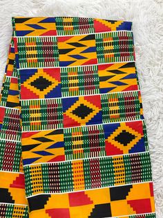 This kente African Fabric is high quality African print made from 100% cotton and it's 45 inches wide. It is used for making African Clothing, African quilts, & For Home decoration. FYI: Print is Double sided. The listing is for 1, 6 yards and Headwrap Each piece of fabric measures:  36in by 45in for 1 yard 216in by 45in for 6 yards 70in by 22in for Head wrap If you purchase more than one yard, you will receive one continuous piece. *If you require more than what I have listed, feel free to send Yellow Fabric With Traditional Patterns For Festivals, Traditional Multicolor Ankara Fabric And Notions, Multicolor Ankara Fabric For Traditional Styles, Traditional Multicolor Ankara Fabric, Traditional Ankara Fabric In Multicolor, Yellow Ankara Fabric With Traditional Patterns, Printed Yellow Ankara Fabric, Yellow Printed Ankara Fabric, Traditional Yellow Fabric With Colorful Pattern