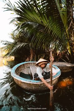 a person in a boat on the water