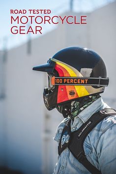 a person wearing a helmet with the words road tested motorcycle gear on it