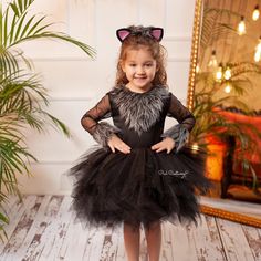 Black Cat Halloween Costume, Halloween Girl Dress, Toddler Girl Costume, Black Girl Dress This cute Black Cat Halloween Costume is our own design and make, handmade with love using the highest quality matt satin, faux fur and dream tulle. The Halloween Girl dress is perfect for birthdays, theme parties, pageants, Halloween and many other special occasions. It has soft lining all over the bodice to prevent irritation to your baby's sensitive skin. It has a zipper on the back and a cat's tail. The cat ear head piece is included. Handmade and can be customized to your own size. Made to Order  Gift message available Shipped from Turkey The actual color may vary from picture due to computer settings. We primarily make custom dresses and beside that we have our own standard sizes based on US Num Toddler Girl Costume, Black Cat Halloween Costume, Toddler Costumes Girl, Girls Black Dress, Cat Halloween Costume, Cute Black Cats, Cat Halloween, Theme Parties, Black Cat Halloween