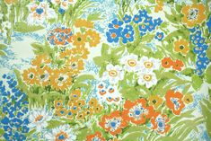 an orange, blue and green floral print fabric