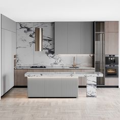 a modern kitchen with marble counter tops and stainless steel appliances