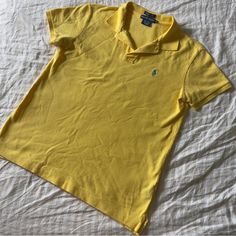 The First Picture Is Truer To Color! (Idk Why My Camera Self-Adjusts Like That Because These Pictures Were Taken At The Same Time. Anyway) Polo By Ralph Lauren No Flaws! Maybe Worn Once! Like New! Nwot Condition Yellow Polo Shirt Extra Button At Side Tag College Graduation Preppy Sporty Americana Summer Cotton Mesh Polo Shirt Golf Country Club Classic Yellow Fitted Top, Classic Fitted Yellow Top, Fitted Classic Yellow Top, Womens Polo Shirt, Americana Summer, Yellow Polo Shirt, Golf Country Club, Collared Top, Yellow Short