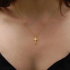 Discover the elegance of our 14K Solid Gold Cross Necklace, thoughtfully designed to add a personalized touch. Through its unique craftsmanship, your precious name takes a graceful position at the cross's pinnacle. As a Tiny Cross Necklace, it emerges as a heartfelt gift, echoing sentiments of love, devotion, and individual essence. PRODUCT DETAILS: * Material: 14K Solid Gold (real solid gold, no gold-filled or no gold plated material) * Choice of Gold Color: Yellow Gold, Rose Gold, White Gold * 14k Gold Initial Necklace, Tiny Cross Necklace, Personalized Cross Necklace, Crucifix Necklace, Tiny Cross, Christian Necklace, Personalized Cross, Custom Cross, Necklace Cross