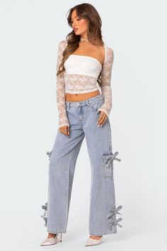 Jeans Low rise waist Bow detailing Baggy fit Denim fabric 100% Cotton Model wears size S Model height is 5'8 Item care: Wash with similar color Low Rise Baggy Jeans, Lace Tube Top, Visionary Fashion, Lace Shrug, Lace Top Long Sleeve, Jeans Low, Swimwear Dress, Baggy Jeans, Sheer Lace