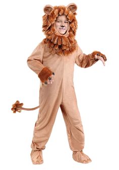 a boy in a lion costume is standing with his arms out and one foot on the ground