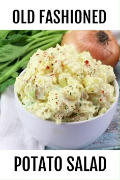 an old fashioned potato salad in a white bowl