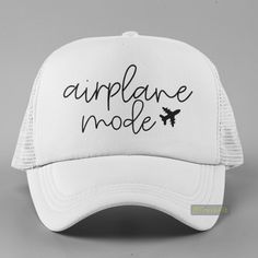 New Hat. For Men Or Women. Airplane Mode Graphic Foam Trucker Hat In White. Lightweight Poly-Foam Trucker Cap With Mesh Back Curved Bill Visor For Optimal Shading Adjustable Plastic Snap Strap Rope Braid Detail Adult Unisex One Size Fits Head Circumferences Up To 60cm Style Tags # Cute Plane Flight Jetset Black Print Script Words On Baseball Hat Cap Vacation Travel Hot Weather Guys Mens Womens Teens Casual Outdoors Original Custom Cool Unique Handmade Trendy Streetwear Big Bold Active Solid Colo Cool Messages, Raffia Sun Hat, Plane Flight, Custom Made Hats, Black Bucket Hat, Cute Caps, Script Words, Gold Hats, Faux Fur Hat