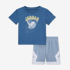 Little ballers-to-be can flaunt their hoop style in this coordinated 2-piece set, designed for movement. The jersey knit tee has a classic cut and the matching poly mesh shorts are breathable so kiddos don't overheat quickly while they play and the stretch waistband provides a comfy fit. Sporty Crew Neck Playwear Set, Sporty Playwear Set With Graphic Print, Sporty Graphic Print Sets For Playwear, Sporty Graphic Print Playwear Set, Cotton Sport Sets With Graphic Print, Cotton Graphic Print Sports Sets, Playful Sports Cotton Sets, Sporty Cotton Sets With Graphic Print, 2 Piece Short Set