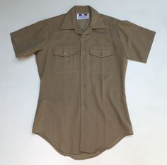 Flying Cross Deluxe Tropical Perma Press S/S Shirt Khaki Tan Uniform Men’s S. New without tag. Note: Please inspect pictures to make sure everything is to your satisfaction. Please review all of the photos to see the exact measurements and con. Will ship by next business day. Thank you for looking. Military Style Short Sleeve Cotton Shirt, Military Style Cotton Short Sleeve Shirt, Military Style Cotton Shirt With Short Sleeves, Military Style Short Sleeve Top With Pockets, Khaki Military Short Sleeve Shirt, Khaki Short Sleeve Military Shirt, Khaki Military Style Short Sleeve Shirt, Fitted Military Collared Top, Fitted Military Tops With Pockets