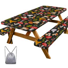 a picnic table with two benches and a bag next to it on a white background