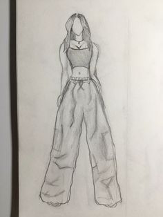 a pencil drawing of a woman's pants and top on a piece of paper