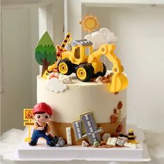 there is a cake that has construction on it