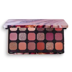 Look and feel flawless with the Forever Flawless Allure Palette. With 18 matte, shimmer and marbled pressed glitter eyeshadows, you’ll be spoilt for choice! With an array of neutrals, warm rust hues and deep glossy berries it’s the perfect palette to create a rich smoky eye. Use soft nude sensation as a base across the lid, blend in risky and suave shades with an eyeshadow brush and deepen along the eye socket with plum nymph. Add highlights of the two-tone glitter shades in flaunt and sinner an Eyeshadow Palette Revolution, Revolution Pallete, Eyeshadow Names, Makeup Revolution Forever Flawless, Makeup Revolution Palette, Revolution Palette, Revolution Beauty, Make Up Forever, Revolution Eyeshadow