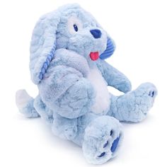 a blue stuffed animal sitting on top of a white floor with its mouth open and tongue out