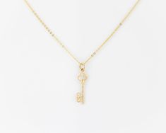 "\"KAYANA\" real vintage, 14k solid gold, dainty minimalist skeleton key pendant (on a complimentary gold plated sterling silver chain). The pendant features two interwoven hearts at the end of the key. We have two of these in stock that are identical, they go well together as a matching set- grab em while they're still available! (Just add two to cart- if only one is available then the other one has sold.) More necklaces: https://dvnejewelryco.etsy.com SIMILARLY: dainty gold plated sterling sil Elegant Key Pendant Necklace, Elegant Sterling Silver Key Jewelry, Elegant Sterling Silver Key Necklace, Classic Jewelry With Keys For Gifts, Elegant Two Keys Necklace As Gift, Elegant Two Keys Necklace Gift, Elegant Two Keys Necklace For Gift, Gold Key Pendant Jewelry, Yellow Gold Key Pendant Jewelry