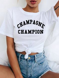 "Champagne Champion T-shirt Cool Casual Funny Hipster Slogan Unisex Tee AVAILABLE SIZES: S,M,L,XL,2XL,3XL COLOR: WHITE, HEATHER GREY, BLACK CONDITION: BRAND NEW T-SHIRT SPECS : 100% high quality pre-shrunk cotton (165 g/m2) jersey). Taped neck and shoulders, twin needle stitching, seamless collar. PRINT: Highest quality print - not cheap \"iron-on\" transfers! MEASUREMENTS : width - armpit to armpit ; length - the body length is measured in a straight line from the highest point of the shoulder Trending T Shirts, Female Shorts, Marca Personal, Rave Wear, Trendy Tshirts, Bulgaria, Fashion Inspo Outfits, Chic Style, Fashion Looks