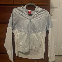 Nike Reflective Windbreaker Nwot Size Small Color: White Great Condition Great For Running/Reflective Make An Offer White Long Sleeve Sportswear Windbreaker, White Nylon Athleisure Outerwear, White Athleisure Nylon Outerwear, Spring Sports White Windbreaker, White Spring Windbreaker For Sports, White Nylon Long Sleeve Windbreaker, White Long Sleeve Nylon Track Jacket, White Long Sleeve Athleisure Windbreaker, White Nike Windbreaker For Fall