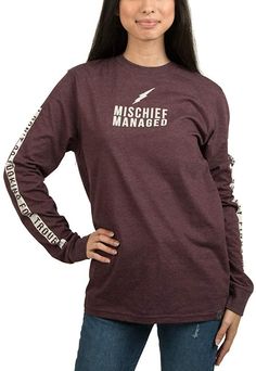 No Harry Potter fan’s clothing collection is complete without this long-sleeve t-shirt. The embroidered text across the front displays the incantation, “Mischief Managed”, which hides the secrets of The Mauraders Map. This t-shirt’s long-sleeves will keep you warm during the brutal winters at Hogwarts. These t-shirts are also made from a poly-cotton fabric which provides comfort as well as durability. You can become the ultimate Harry Potter fan with this long-sleeve tee.•OFFICIALLY LICENSED - T The Mauraders Map, Hogwarts Clothes, Harry Potter Mischief Managed, T-shirt Display, Universal Shirts, Embroidered Text, Harry Potter Tshirt, Harry Potter Merchandise, Harry Potter Christmas