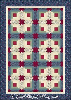 a quilt made with red, white and blue stars on it's border is shown